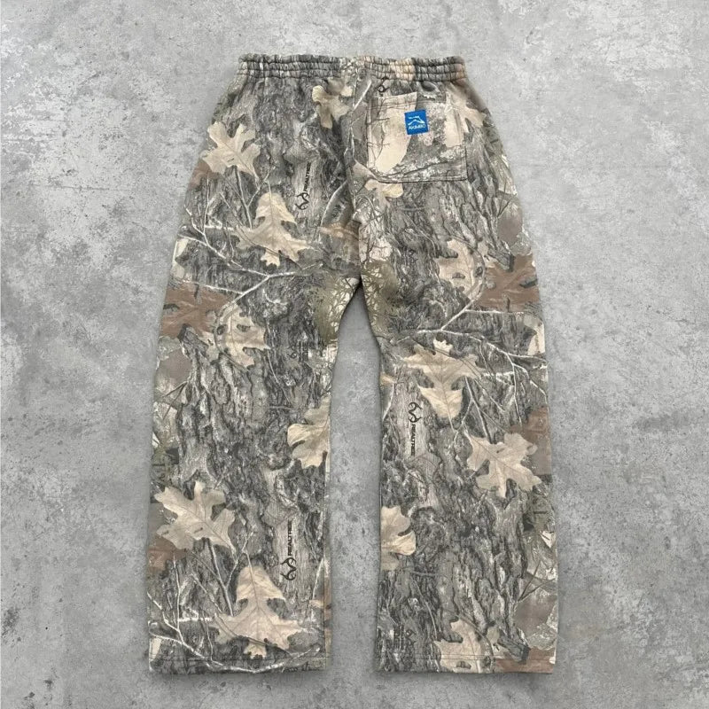 Camo pattern pants by My Store, showing a close-up of the stylish camouflage design and fabric texture.