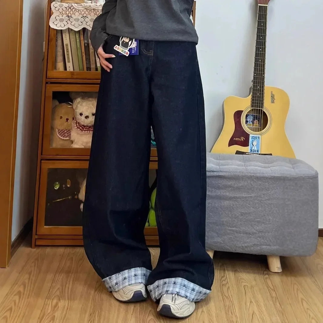 Drapey wide denim jeans from My Store with relaxed fit, showcasing light blue, distressed fabric and casual style.