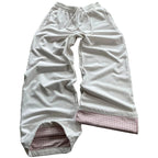Wide 2000s style pants from My Store, featuring a relaxed fit and vintage-inspired design, shown on a model against a neutral background.
