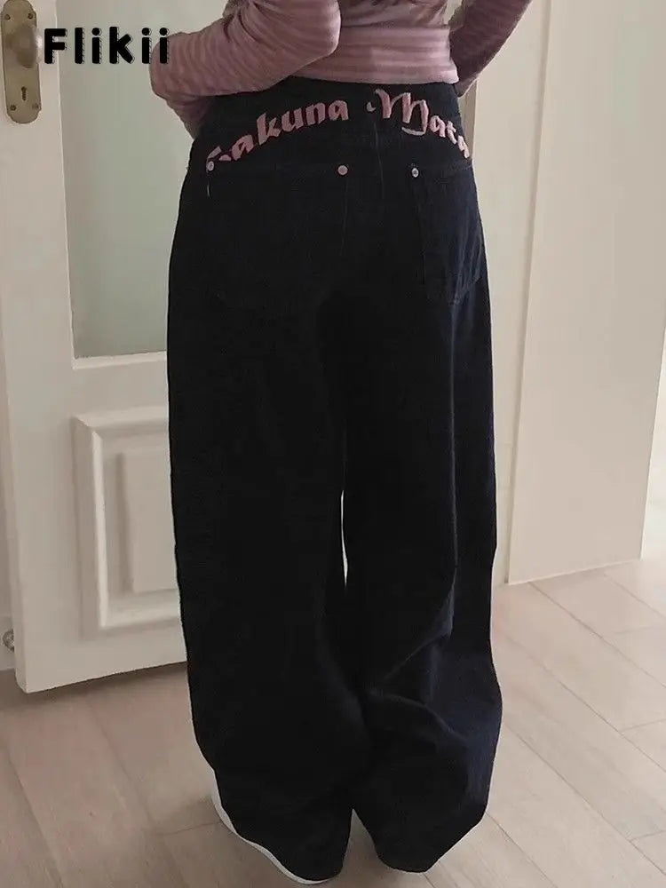 Baggy denim jeans from My Store, featuring relaxed fit, classic blue wash, and casual style, displayed on a hanger.