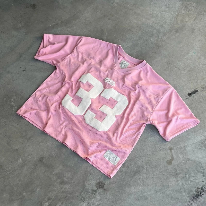 My Store 33 Jerseys collection featuring various sports jerseys with team logos and vibrant colors displayed on hangers.
