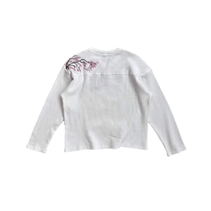 White Cherry Blossom T-shirt from Deeptown, featuring a floral design, displayed on a plain background.