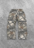 CamoPattern pants by My Store featuring a camouflage design, tailored fit, and casual style, displayed on a mannequin.