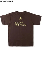 Cactus Jack T-shirt by My Store featuring a graphic print, casual fit, and cotton fabric in black with colorful design elements.