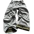 Pair of 2000s wide-leg pants from My Store, featuring a relaxed fit and casual style, shown in a front view.