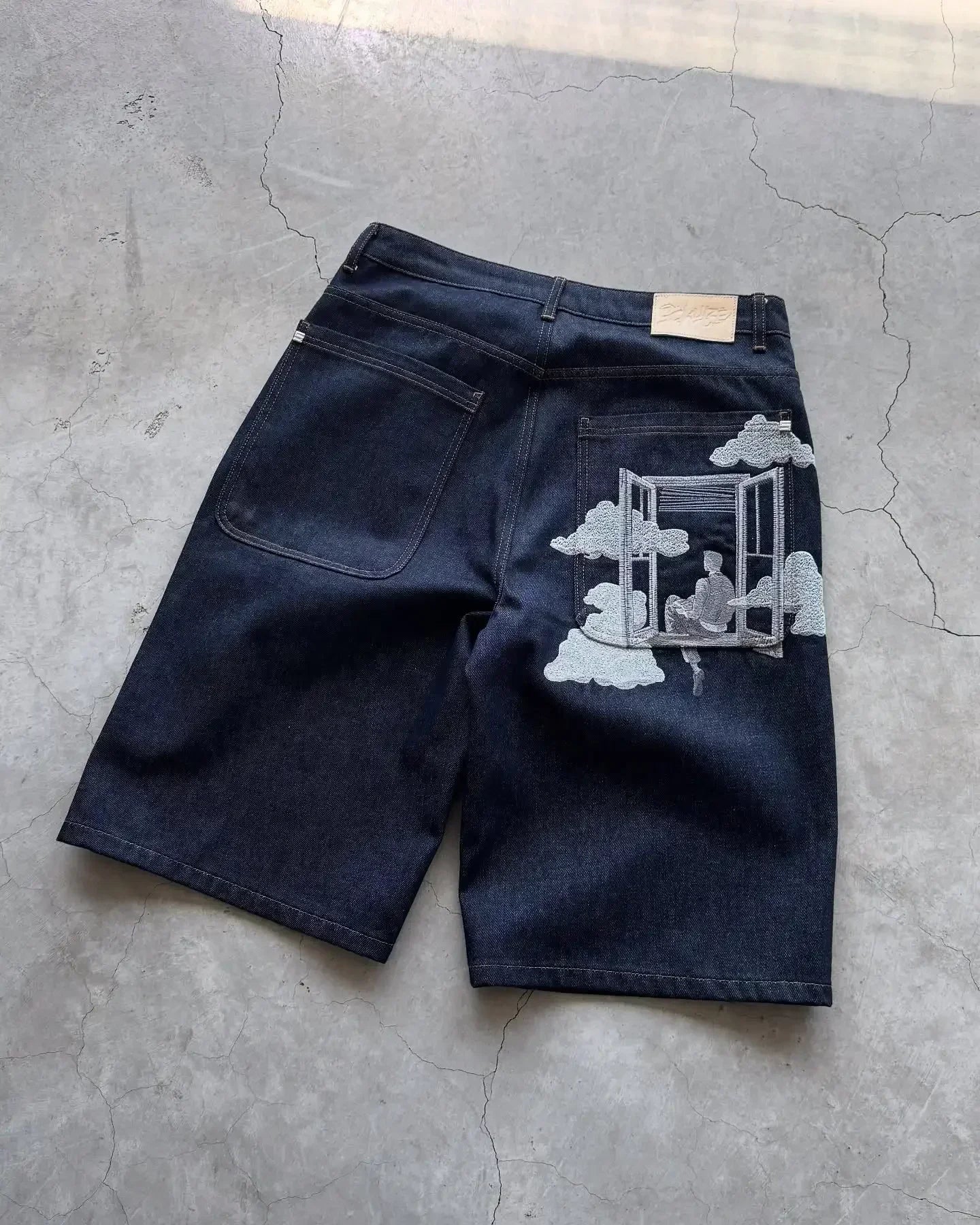 Vintage denim shorts from My Store, showcasing classic blue wash, frayed hems, and high-waisted fit on a white background.