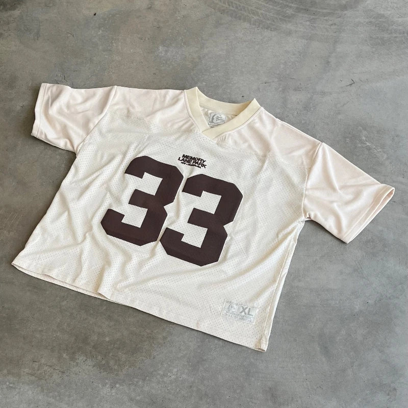 Blue and white 33 jerseys from My Store, featuring team logo and bold number 33 on the front, displayed on a hanger.