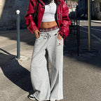 NOIZSY double waist X red baggy pants featuring a relaxed fit, visible in the image with a focus on the waistband and fabric texture.