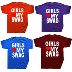 Girl wearing a white "Girls Love My Swag" T-shirt by My Store, showcasing casual fashion and trendy graphic design.