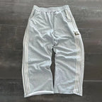 NOIZSY striped baggy pants featuring a relaxed fit with bold horizontal stripes and a comfortable, casual style.