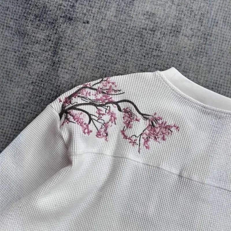 White cherry blossom T-shirt from Deeptown by My Store, featuring a soft, stylish design on a comfortable cotton fabric.