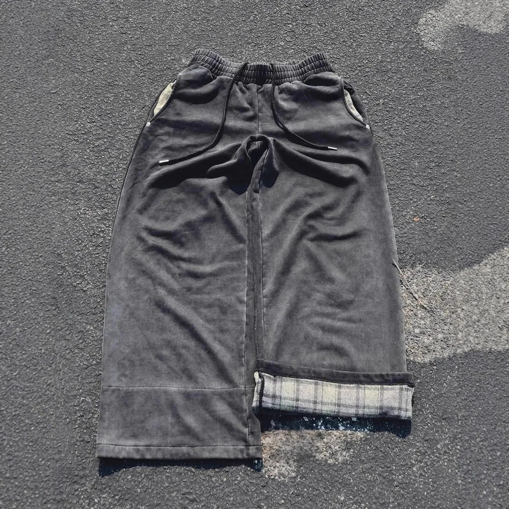 Wide 2000s style pants by My Store, featuring a relaxed fit and retro design, shown in a full-length image.