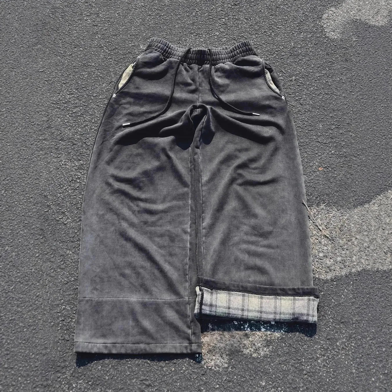 Wide 2000s style pants by My Store, featuring a relaxed fit and retro design, shown in a full-length image.