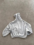 Gray both-sided hoodie by My Store featuring a reversible design and comfortable fit, shown on a model.