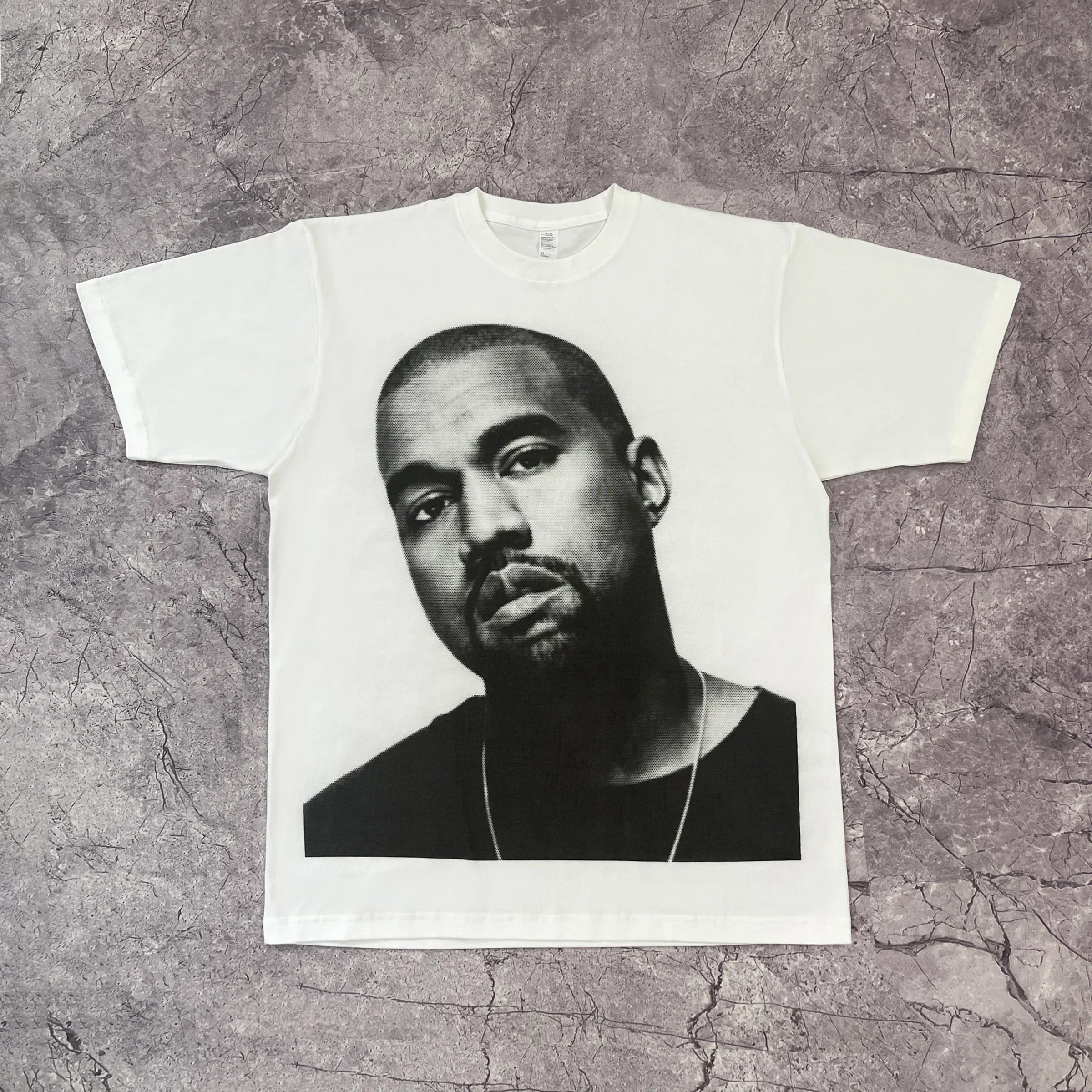 Vintage 2000s rapper T-shirt featuring bold graphic design, classic fit, and retro style from the 2000s era.