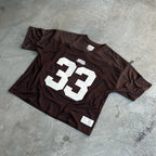 My Store 33 jerseys, colorful athletic shirts displayed on hangers, showcasing a variety of sports jersey designs.