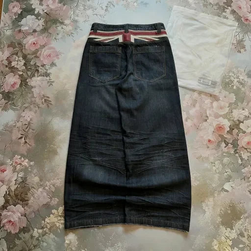 High waisted washed denim jeans from My Store, showing a close-up of the faded, distressed fabric and classic denim stitching.