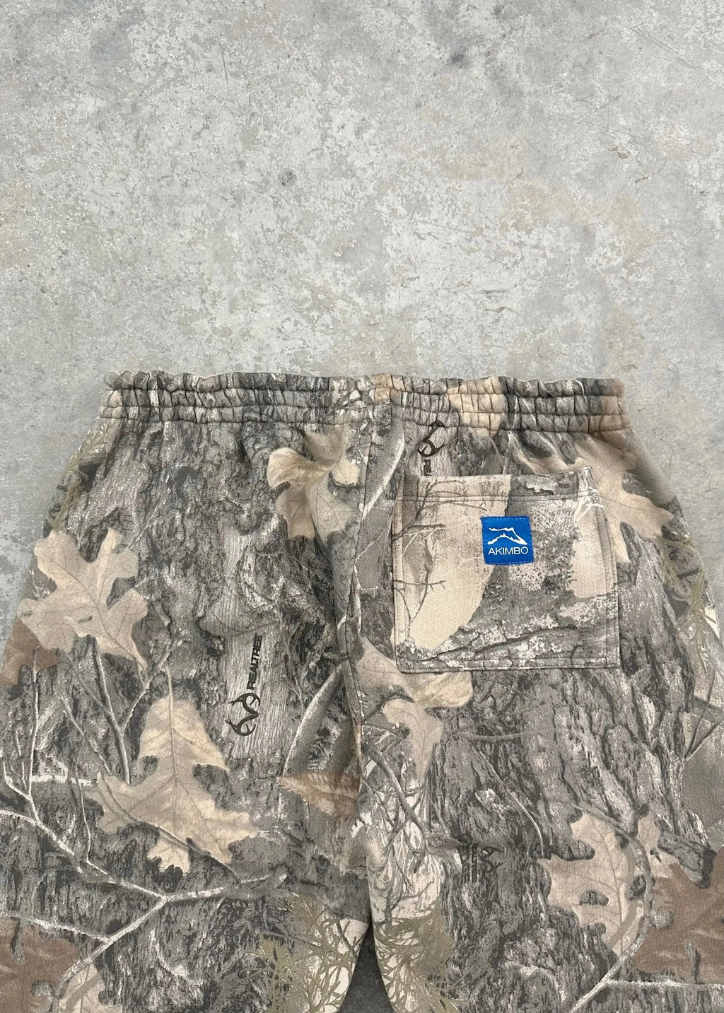 CamoPattern pants by My Store featuring a camouflage design, shown in a close-up of the fabric and pattern details.