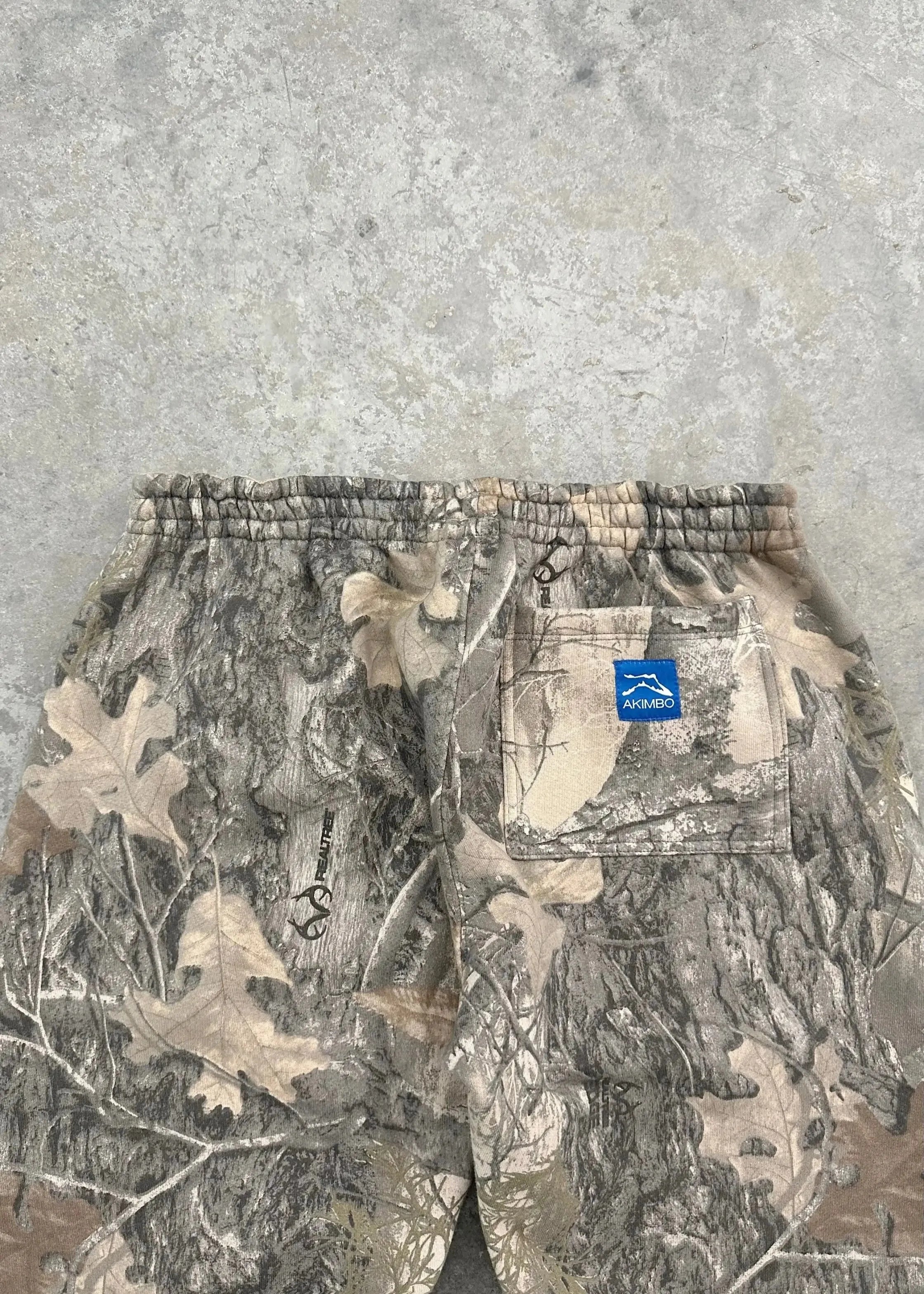 CamoPattern pants by My Store featuring a camouflage design, shown in a close-up of the fabric and pattern details.