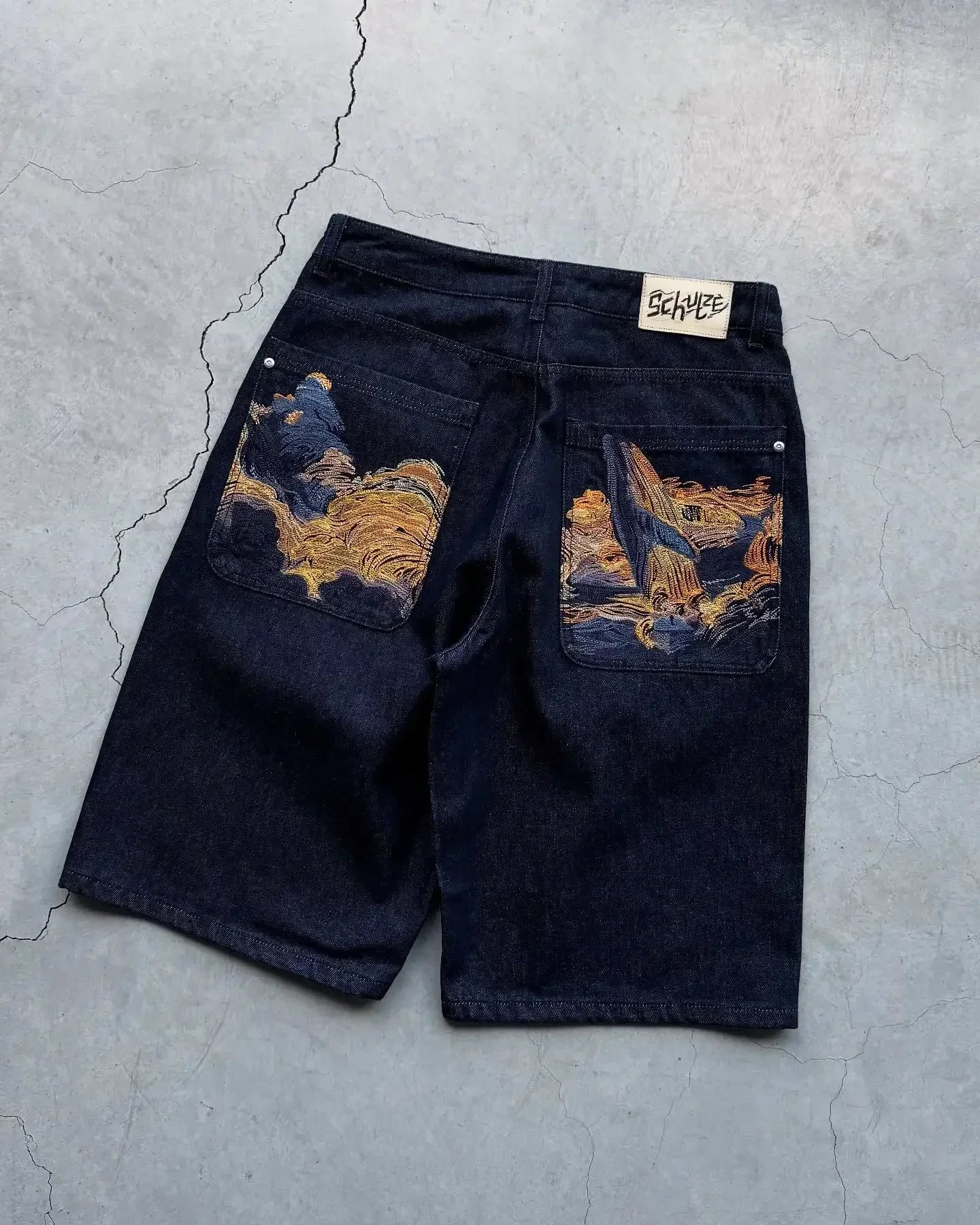 Vintage denim shorts from My Store, featuring distressed fabric and classic five-pocket design, laid flat on a white background.